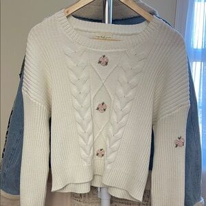 Elegant Cream Sweater with Pink Floral Details